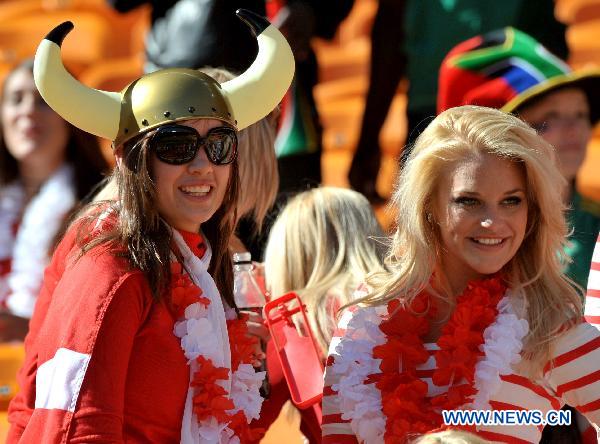 Girls from Danmark cheer before the Group E first round 2010 World Cup football match between Netherlands and Denmark at Soccer City stadium in Johannesburg, South Africa, on June 14, 2010.