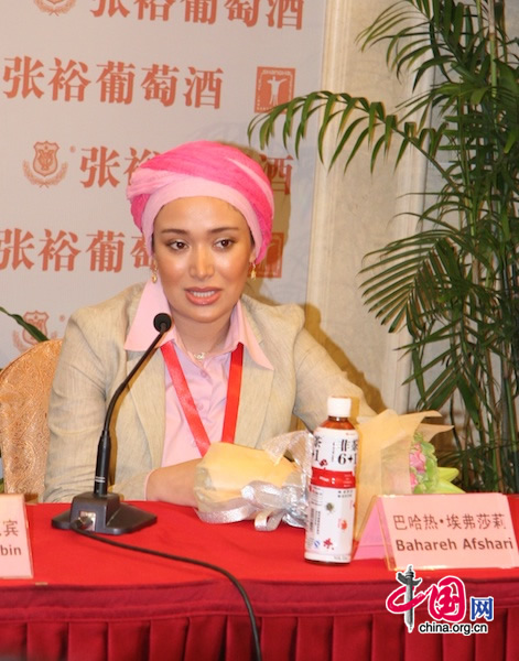 Iranian actress Bahareh Afshari speaks at a press conference for the movie Pay Back that she stars in at Shanghai Film Art Center in Shanghai on June 16, 2010.