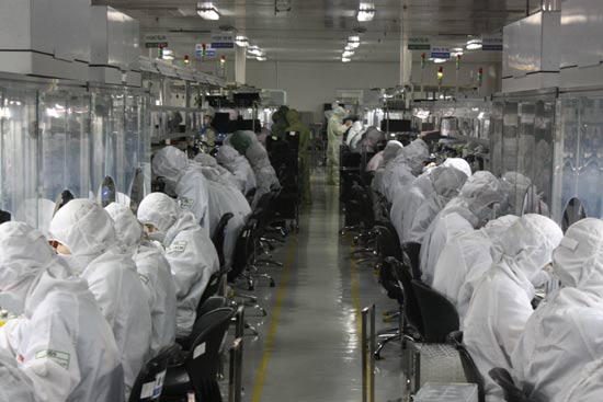 Staff are hard at work on the factory floor at Truly Semiconductors, arguably the largest employer in Shanwei. It is a major LCD screen producer. [China Daily]