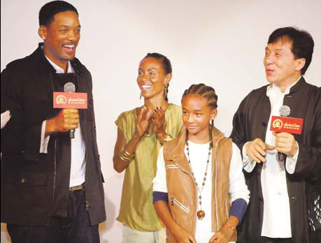 Will Smith, his wife Jada, son Jaden and Jackie Chan in Beijing.