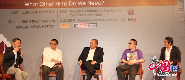 From left to right, Chinese directors He Ping, Wang Xiaoshuai, John Woo, Pang Ho-Cheung and Doze Niu hold a dicussion panel at Shanghai Film Art Center on June 17, 2010.