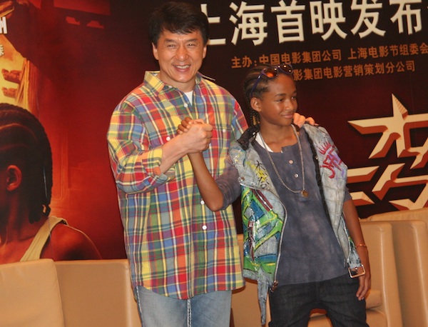  Actor Jackie Chan (left) and actor Jaden Smith pose at a press conference to promote the movie “The Karate Kid” in Shanghai on June 18. [Pang Li/China.org.cn]