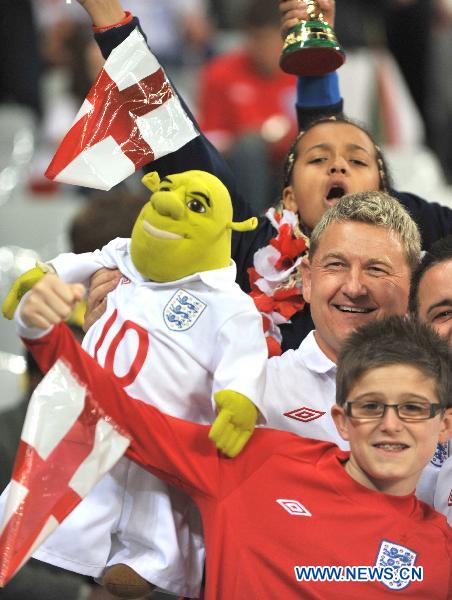 Fans wait for the start of the 2010 World Cup Group C match between England and Algeria in Cape Town, South Africa, June 18, 2010. 