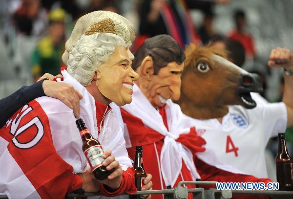 Fans wait for the start of the 2010 World Cup Group C match between England and Algeria in Cape Town, South Africa, June 18, 2010.