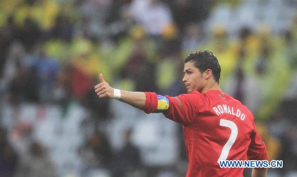 Cristiano Ronaldo of Portugal thumbs up to a teammate during the 2010 World Cup group G soccer match against Democratic People's Republic of Korea (DPRK) at Green Point stadium in Cape Town, South Africa, June 21, 2010. (Xinhua/Xing Guangli)