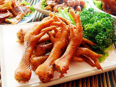 The first dish I was ever served in China was cold pickled chicken's feet.