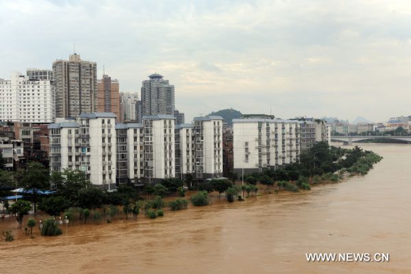 PPhoto taken on June 19, 2010 shows the flooded Liujiang River in Liuzhou, south China&apos;s Guangxi Zhuang Autonomous Region. 