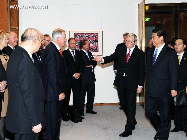 Chinese Vice President Xi Jinping (R Front) and Australian Prime Minister Kevin Rudd (R2 Front) meet with Chinese and Australian entrepreneurs in Canberra, capital of Australia, June 21, 2010. [Rao Aimin/Xinhua]