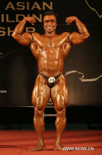 Aatif Anwar of Pakistan competes during the Heavy Weight (+90Kg) category at the 7th South Asian Men&apos;s Bodybuilding Championship in Kathmandu, capital of Nepal, June 19, 2010. [Xinhua]