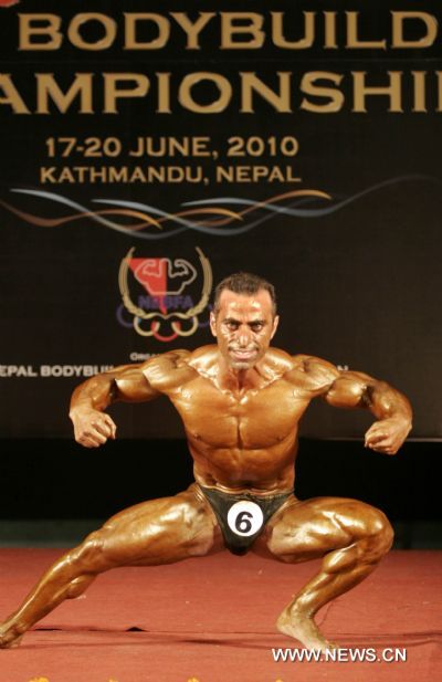 Mohammed Bilal of Pakistan competes during the Light Fly Weight (55Kg) category at the 7th South Asian Men&apos;s Bodybuilding Championship in Kathmandu, capital of Nepal, June 19, 2010. [Xinhua]