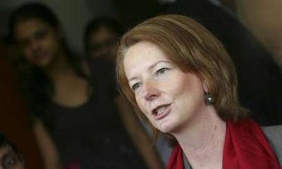 Australia's Deputy Prime Minister Julia Gillard speaks to the media after addressing a lecture themed 'Women and Leadership' at a women's college in New Delhi in this August 31, 2009.[Xinhua]