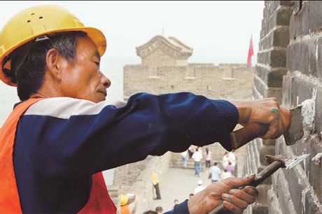 Maintenance work on the 'Old Dragon Head', the part of the Great Wall which enters the Bohai Sea.
