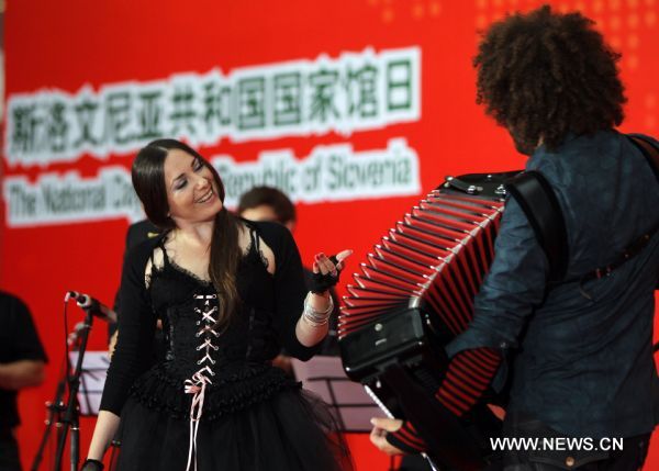 A band performs during activities marking the National Pavilion Day of Slovenia in the World Expo Park in Shanghai, east China, on June 24, 2010. The National Pavilion Day of Slovenia was celebrated on Thursday. 