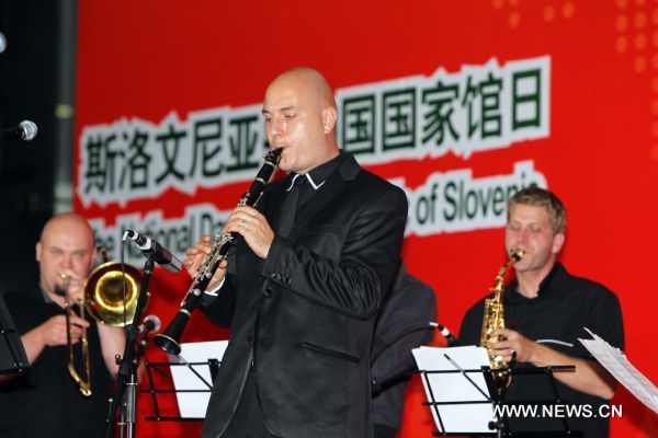 A band performs during activities marking the National Pavilion Day of Slovenia in the World Expo Park in Shanghai, east China, on June 24, 2010. The National Pavilion Day of Slovenia was celebrated on Thursday. 