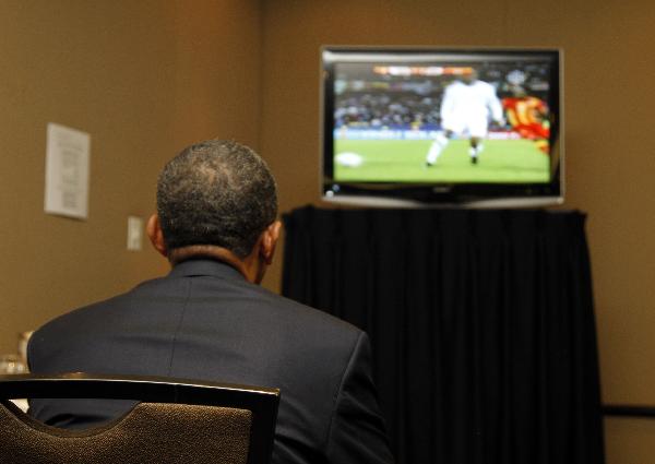 U.S. President Barack Obama watches a live telecast of the 2010 World Cup soccer match between the U.S. and Ghana during a short break at the G20 Summit in Toronto June 26, 2010.