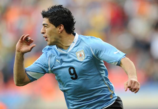 Uruguay's Luis Suarez celebrates his goal during the 2010 World Cup round of 16 soccer match against South Korea at Nelson Mandela Bay stadium in Port Elizabeth, South Africa, on June 26, 2010. (Xinhua/Chen Haitong)