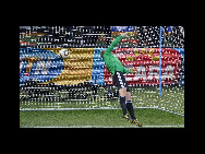 Germany's goalkeeper Manuel Neuer watches as the ball crosses the line during the 2010 World Cup second round soccer match against England at Free State stadium in Bloemfontein June 27, 2010. [sport. sina.com] 