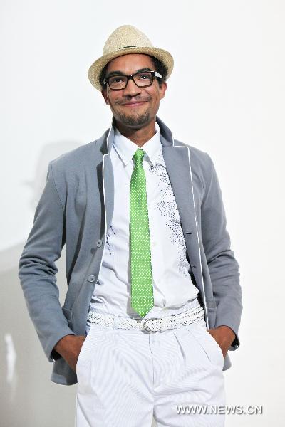 A model displays a creation for Agnès B. during the Men's 2011 Spring-Summer ready-to-wear collection show in Paris, June 27, 2010. 