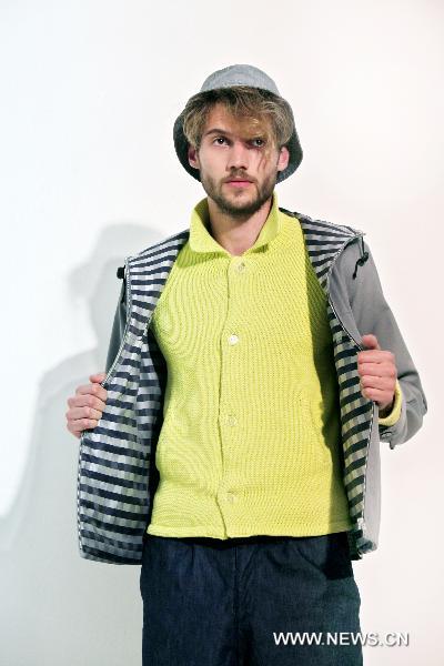 A model displays a creation for Agnès B. during the Men's 2011 Spring-Summer ready-to-wear collection show in Paris, June 27, 2010. 