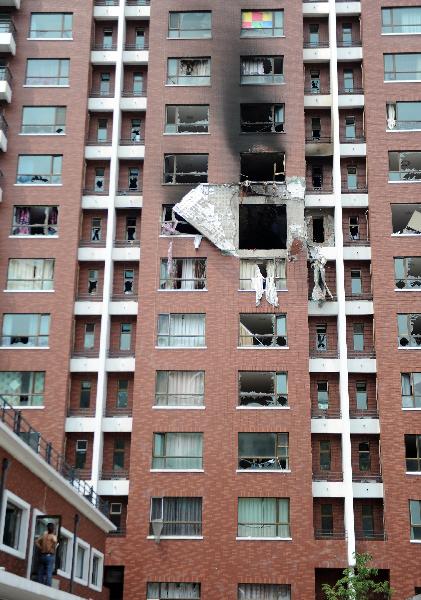 Photo taken on June 28, 2010 shows the building that a blast occurred in Changchun, northeast China&apos;s Jilin Province. The blast occurred in a building of Changyingshiji village in Changchun caused fire and left one dead and six injured. Now the cause of the blast is under investigation. [Xinhua]