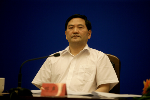 Deng Shengming finds his feet as a spokesman at a press conference on Mondy. 