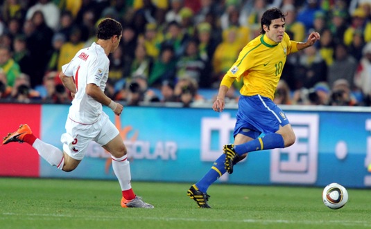 Kaka dribbles the ball in the game against Chile.