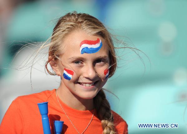 A fan of the Netherlands cheers prior to the 2010 World Cup round of 16 soccer match between the Netherlands and Slovakia at Moses Mabhida stadium in Durban, South Africa, on June 28, 2010. (Xinhua/Chen Haitong)