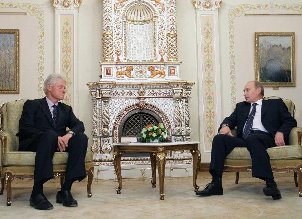 Russian Prime Minister Vladimir Putin, right, and former U.S. President Bill Clinton seen during their meeting in the Novo-Ogaryovo residence outside Moscow, Russia, Tuesday, June 29, 2010. Putin criticised the U.S. arrests of suspects in an alleged Russian spy ring and said on Tuesday he hoped the scandal would not set back improving Russian-U.S. ties. [Xinhua]