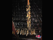 Dried salmons hanging on the ceiling of a house of Ainu people in north Japan's Hokkaido.