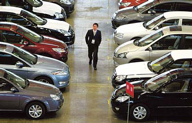 New cars on sale at an automart in Nanjing. The government moves will help sales of green cars.[China Daily]