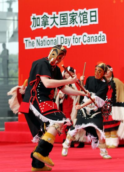 Canadian actors perform during a ceremony marking the Canada National Pavilion Day at the Shanghai World Expo in Shanghai, east China, July 1, 2010. 