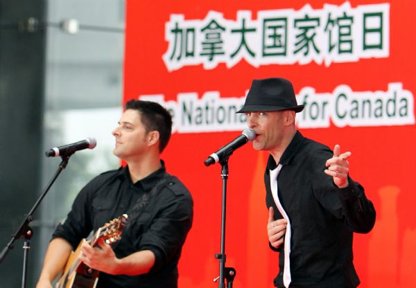 Canadian actors perform during a ceremony marking the Canada National Pavilion Day at the Shanghai World Expo in Shanghai, east China, July 1, 2010. 