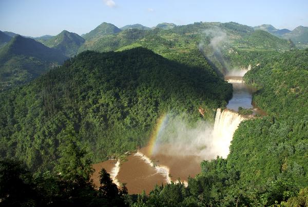 Photo taken on July 2, 2010 shows the scene of Jiulong Waterfall in Luoping County, southwest China's Yunnan Province. The Jiulong Waterfall has entered a high flow season due to the enduring heavy rainfall recently. [Xinhua/Mao Hong] 