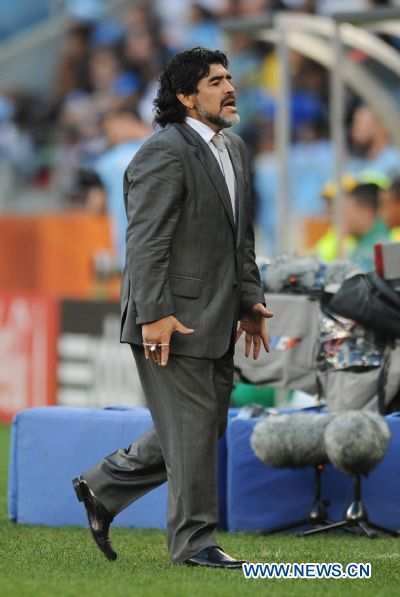Argentina's head coach Diego Maradona,reacts during the 2010 World Cup quarter-final soccer match against Germany at Green Point stadium in Cape Town, South Africa, on July 3, 2010.Germany won 4-0 and is qualified for the semi-finals. (Xinhua/Chen Haitong) (dl) 