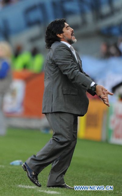 Argentina's head coach Diego Maradona,reacts during the 2010 World Cup quarter-final soccer match against Germany at Green Point stadium in Cape Town, South Africa, on July 3, 2010.Germany won 4-0 and is qualified for the semi-finals. (Xinhua/Chen Haitong) (dl) 