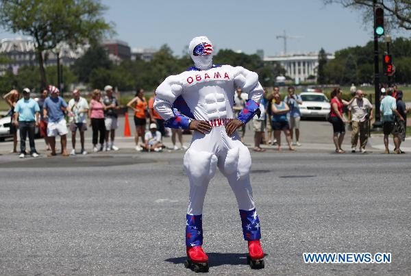 A man takes part in the Independence Day parade in Washington D.C., capital of the United States, July 4, 2010. The United States celebrated its 234th Independence Day on Sunday. [Zhang Jun/Xinhua]