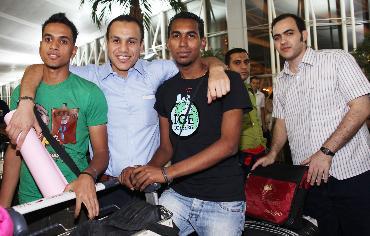 Students from the Confucius Institute of Cairo University are about to leave for summer camp in China at the Cairo Airport, Egypt, on July 1, 2010. [Xinhua photo]