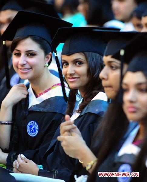 Foreign students attend graduation at Tianjin Medical University in north China's Tianjin Municipality, on July 6, 2010. More than 340 foreign students graduated from Tianjin Medical University Tuesday.