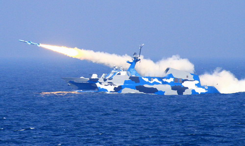 A warship launches a missile in the East China Sea during a military exercise held by the Chinese navy on July 6, 2010. A routine drill consisting of dozens of aircraft and warships kicked off at the beginning of July.