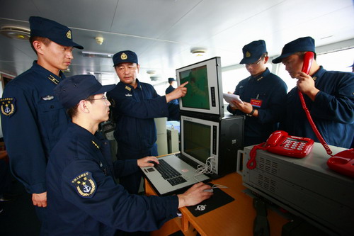 A warship launches an intercept missile in the East China Sea during a military exercise held by the Chinese navy on July 6, 2010.[