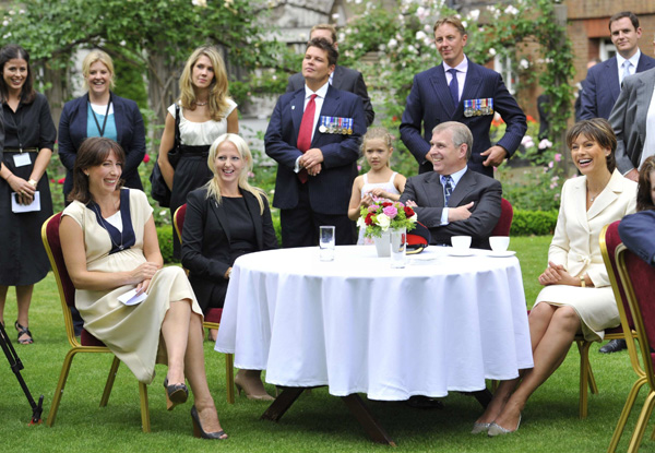 Samantha Cameron (front L), wife of Britain&apos;s Prime Minister David Cameron, listens to speeches with Services widow Christina Schmid, Prince Andrew and British television presenter Kate Silverton (L-R) as she hosts a reception at Downing Street in central London July 7, 2010. Samantha was announced as a Patron for Tickets for Troops as she hosted her first charitable reception at the Prime Minister&apos;s official residence.[Xinhua]