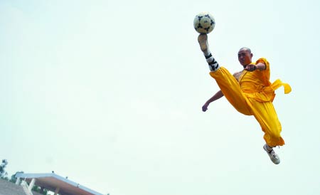 A Shaolin soccer team is started by a 17-year-old monk Li Lin a few weeks ago in Zhengzhou, capital of Henan province, taking inspiration from Stephen Chow&apos;s movie and the World Cup. The team trained about four hours every weekend with coach Wang Xiaobo, a Tagou school physical education tutor. [sina.com.cn] 