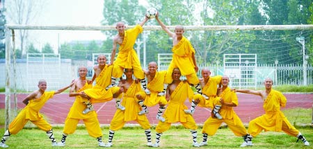 A Shaolin soccer team is started by a 17-year-old monk Li Lin a few weeks ago in Zhengzhou, capital of Henan province, taking inspiration from Stephen Chow&apos;s movie and the World Cup. The team trained about four hours every weekend with coach Wang Xiaobo, a Tagou school physical education tutor. [sina.com.cn] 