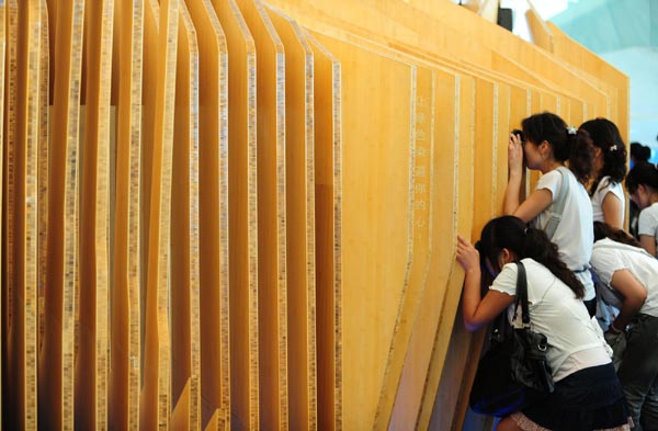 Wooden Norway Pavilion shining at Expo