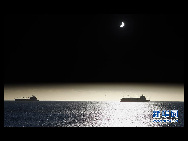 The moon passes between the sun and the earth during a solar eclipse in Valparaiso City, 75 miles (121 km) northwest of Santiago, July 11, 2010.[Xinhua/Reuters] 