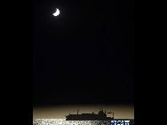 The moon passes between the sun and the earth during a solar eclipse in Valparaiso City, 75 miles (121 km) northwest of Santiago, July 11, 2010.[Xinhua/Reuters] 