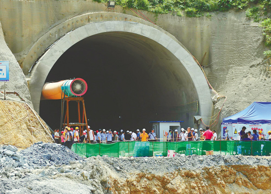 The site of the collapsed railway tunnel in southwest China's Guangxi Zhuang Autonomous Region. Rescuers said Tuesday the drilling of a passage through the debris of the collapsed railway tunnel to rescue 10 trapped workers is progressing slowly. 