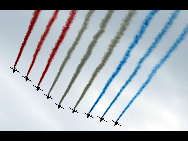 Planes fly during the France's Bastille Day military parade held in Paris, capital of France, on July 14, 2010.  [Xinhua]