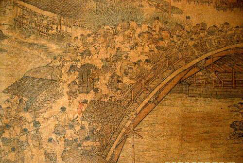 Part of the painting Along the River During the Qingming Festivalis seen in this picture. The famous ancient painting, a masterpiece by the imperial court painter Zhang Zeduan, is a long painted scroll 528 cm long and 24.8 cm wide, which portrays street scenes of Bianjing (today&apos;s Kaifeng City, central China&apos;s Henan Province), the capital of the Northern Song Dynasty (960-1127). [Xinhua]
