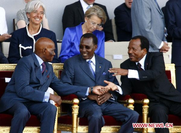 (From L to R) Senegalese President Abdoulaye Wade, Chadian President Idriss Deby and Cameroon President Paul Biya talks during the France&apos;s Bastille Day military parade held in Paris, capital of France, on July 14, 2010. French President Nicolas Sarkozy and leaders from 13 African countries attended the military parade marking France&apos;s Bastille Day on July 14. [Zhang Yuwei/Xinhua]